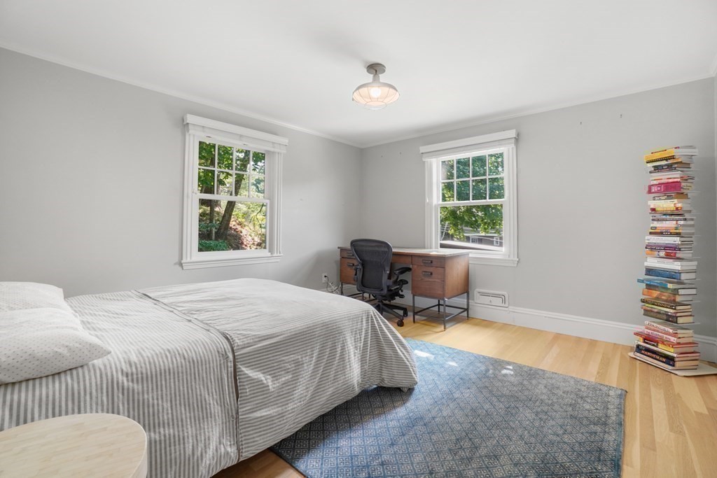 12 Swarthmore Road Wellesley, MA 02482 - Photo 31 of 38 a bedroom with a bed a table and a window