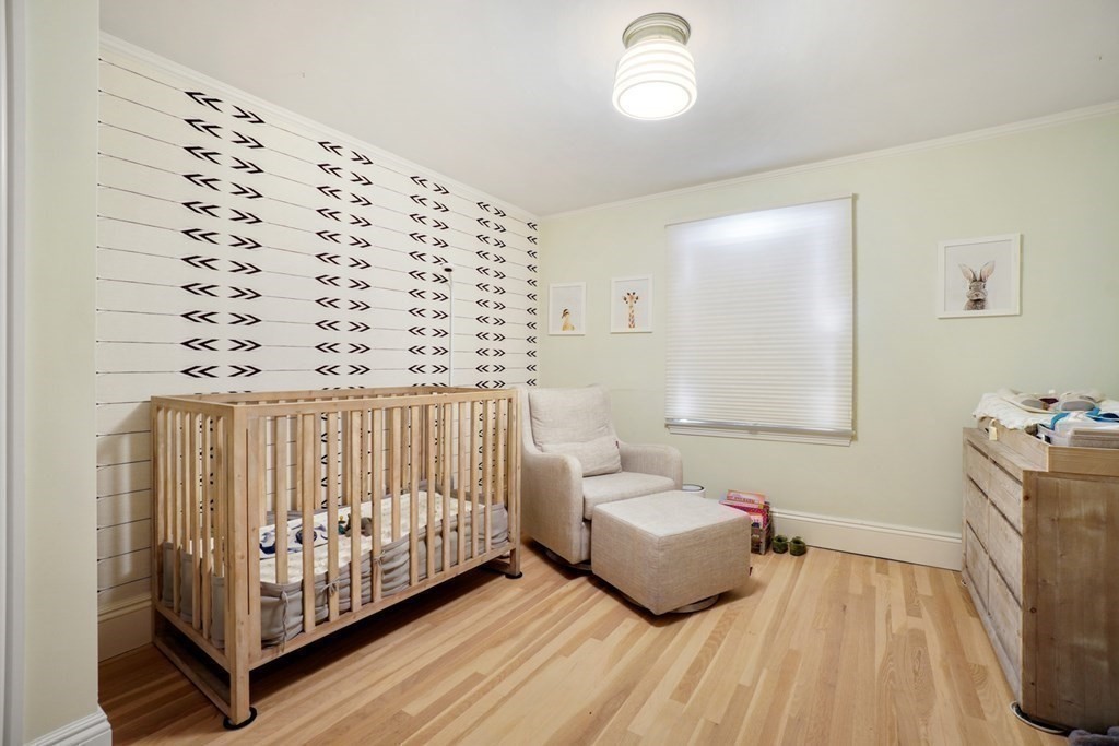12 Swarthmore Road Wellesley, MA 02482 - Photo 32 of 38 a bedroom with furniture and a window