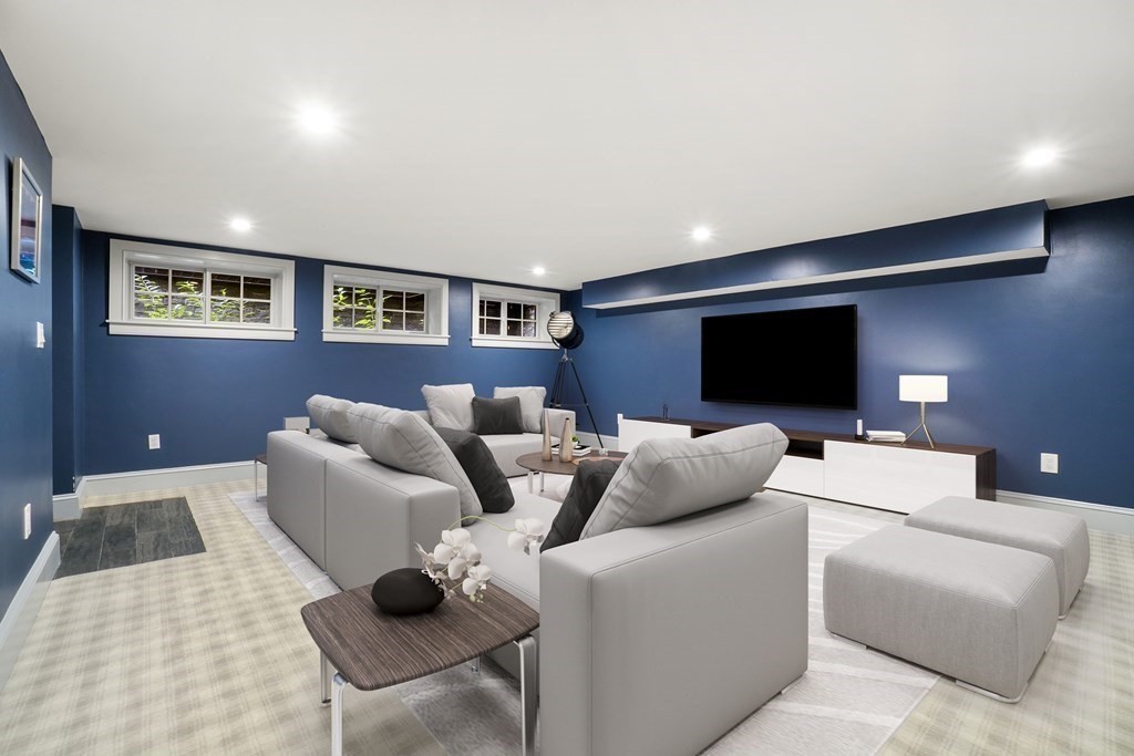 12 Swarthmore Road Wellesley, MA 02482 - Photo 33 of 38 a living room with furniture and a flat screen tv