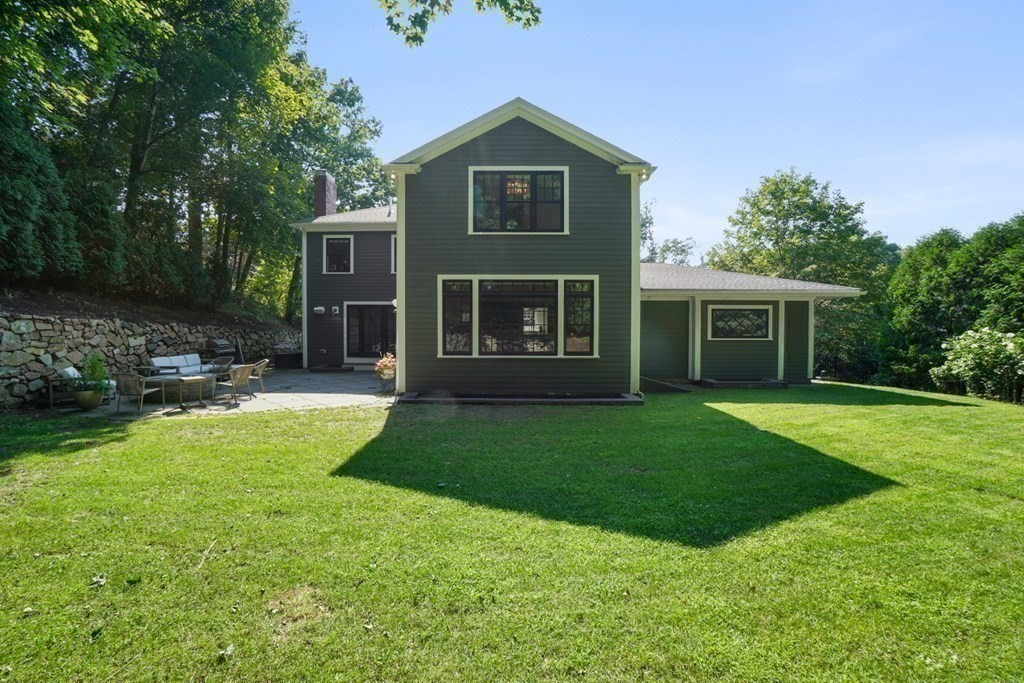 12 Swarthmore Road Wellesley, MA 02482 - Photo 37 of 38 a front view of a house with garden