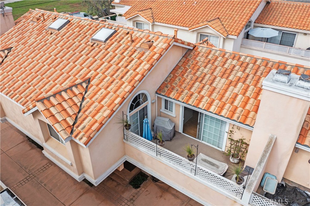2517 Rockefeller Lane, Unit B Redondo Beach, CA 90278 - Photo 24 of 36 a house with trees in front of it