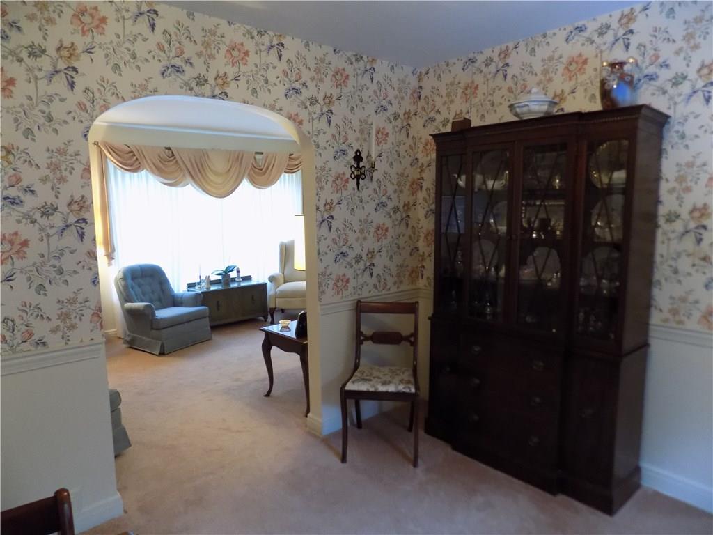 2510 Collins Road Churchill, PA 15235 - Photo 8 of 25 Graceful arch separates living room and dining room.