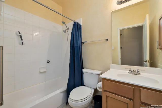 a view of a backyard with sitting area