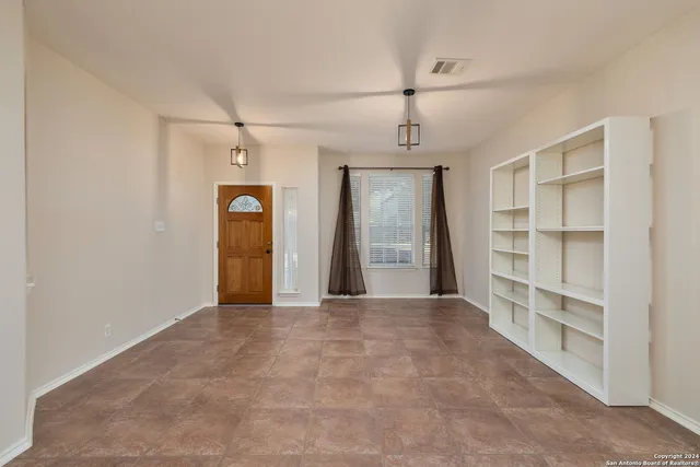 a view of a livingroom with a staircase