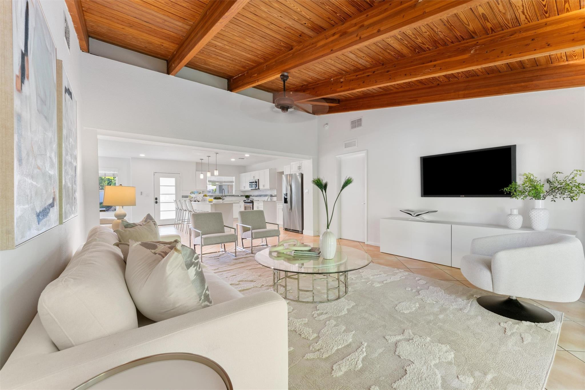 3203 Dover Road Pompano Beach, FL 33062 - Photo 13 of 45 a living room with furniture and a flat screen tv