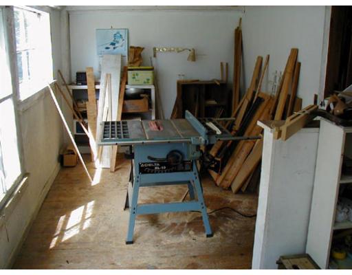 332 Zoar Road Rowe, MA 01367 - Photo 5 of 14 a view of a room with gym equipment