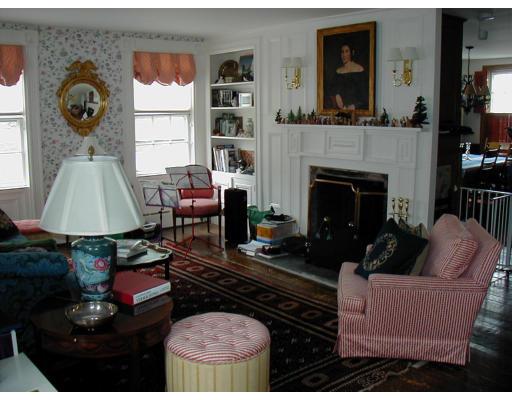 332 Zoar Road Rowe, MA 01367 - Photo 6 of 14 a living room with furniture a fireplace and a window