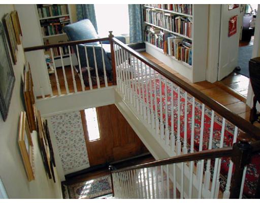 332 Zoar Road Rowe, MA 01367 - Photo 8 of 14 a view of entryway and hall with wooden floor