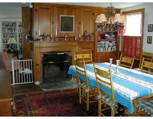 332 Zoar Road Rowe, MA 01367 - Photo 10 of 14 a living room with furniture a fireplace and a flat screen tv