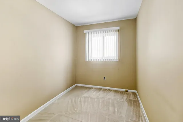 a view of a room with a window