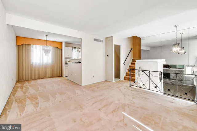 a view of a livingroom with a furniture