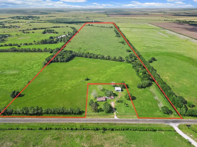 a view of a lush green field