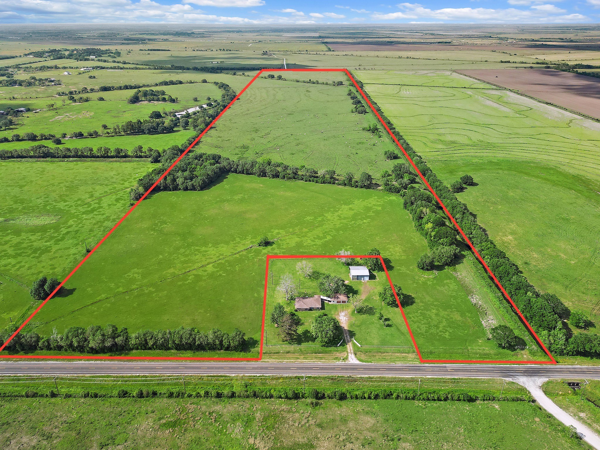 0 State Highway Winnie, TX 77665 - Photo 1 of 7 a view of a lush green field