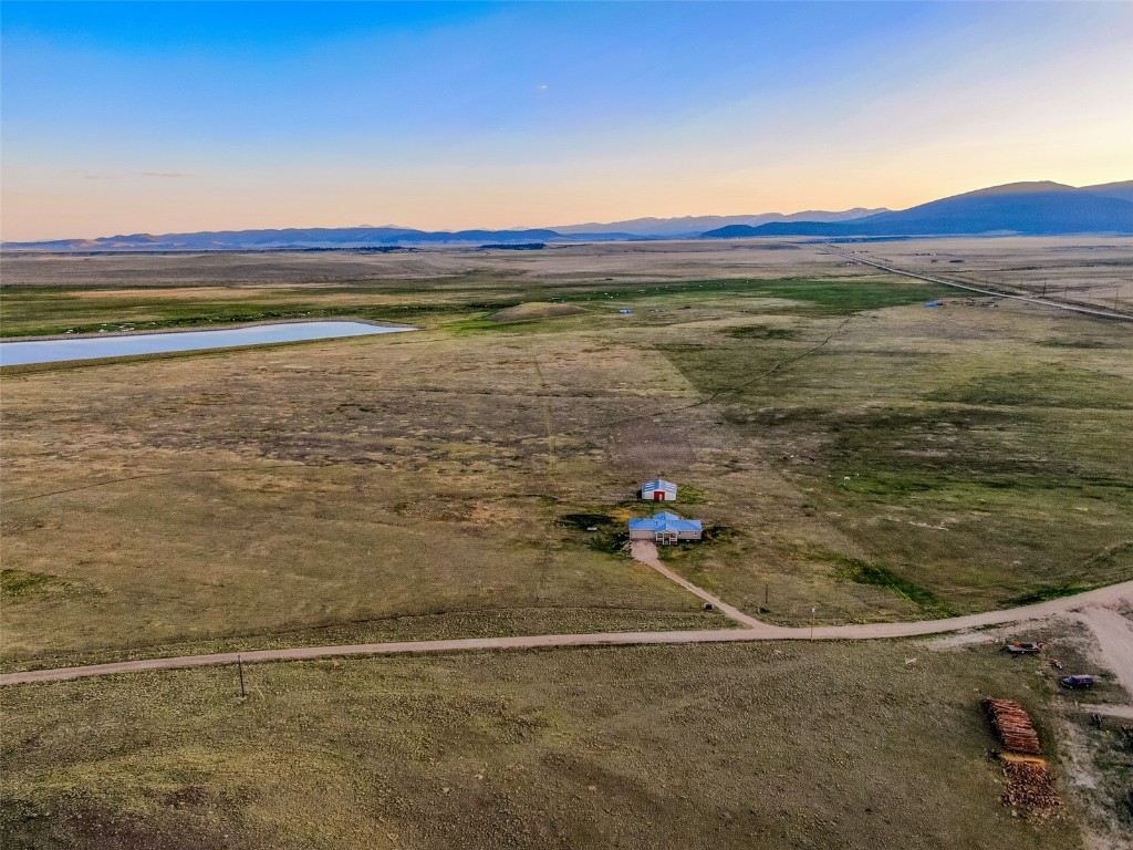 465 Litmer Road Jefferson, CO 80456 - Photo 23 of 50 Aerial view of a water and mountain view