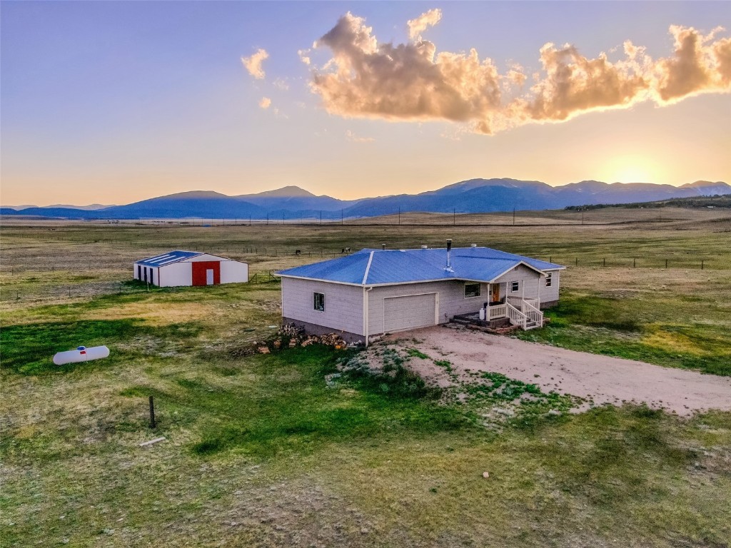 465 Litmer Road Jefferson, CO 80456 - Photo 26 of 50 View of mountain backdrop featuring rural landscape
