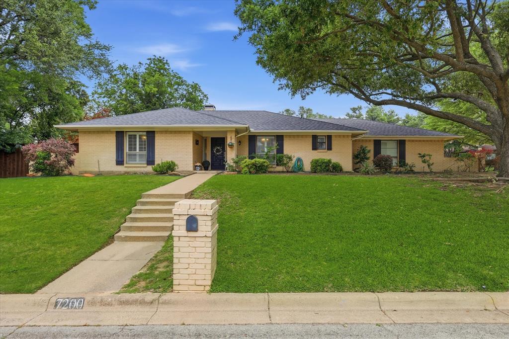 Ranch-style 3 bedroom, 2 bath home brick home on large corner lot.