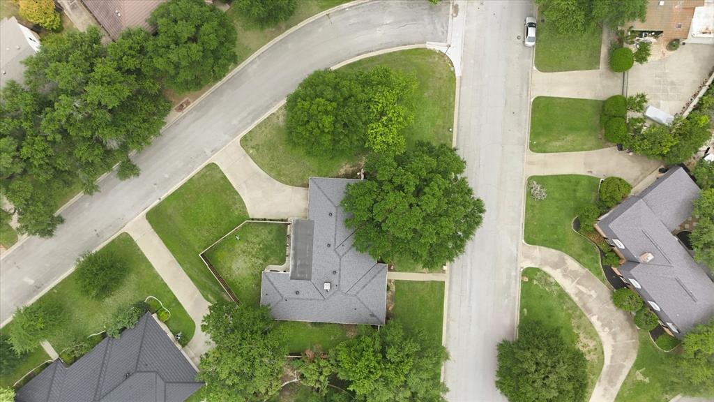 7200 Tamarack Road Benbrook, TX 76116 - Photo 34 of 38 Aerial view of residence with mature trees and large corner lot.
