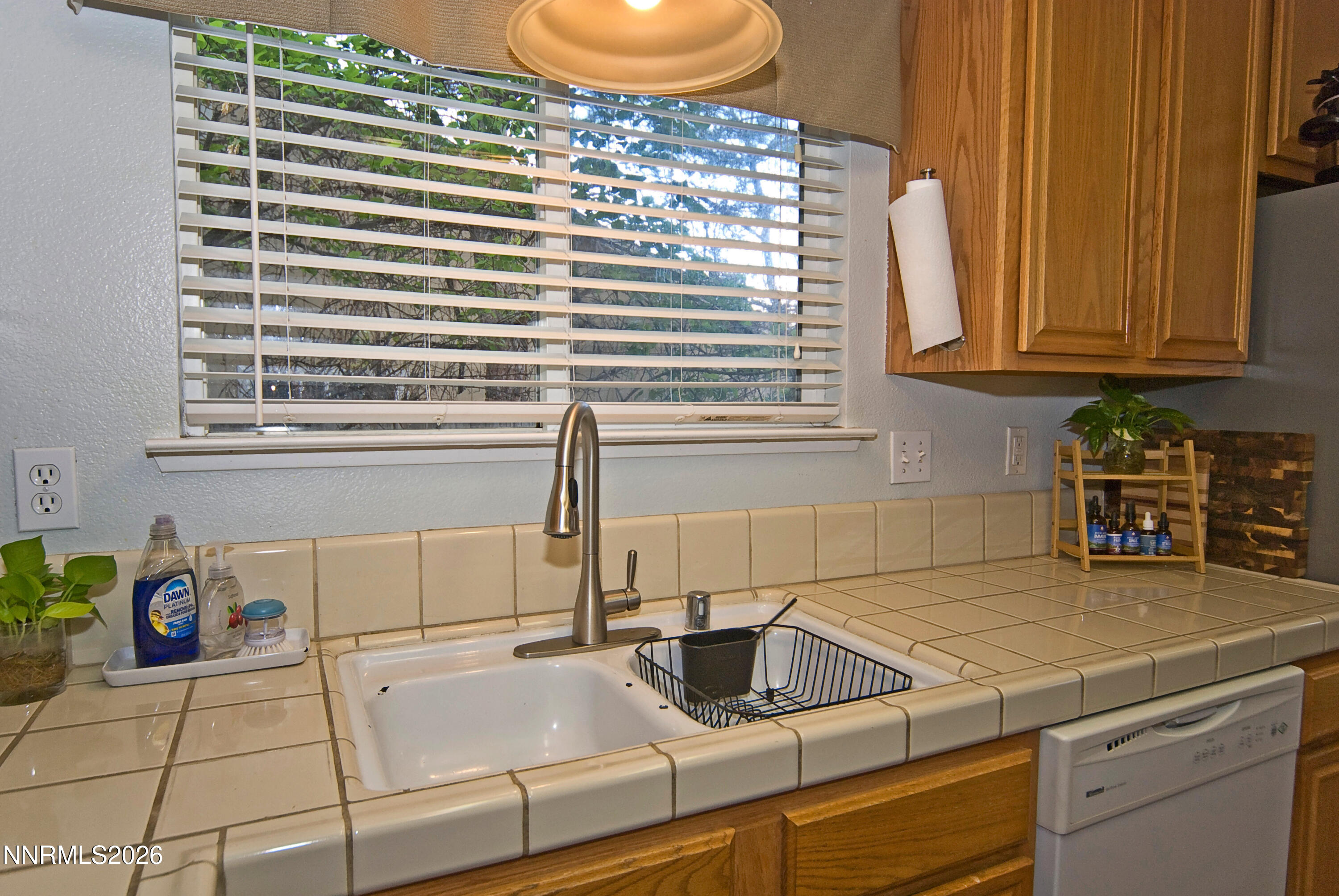 3289 Epic Avenue Reno, NV 89512 - Photo 17 of 32 a kitchen with a sink and a window