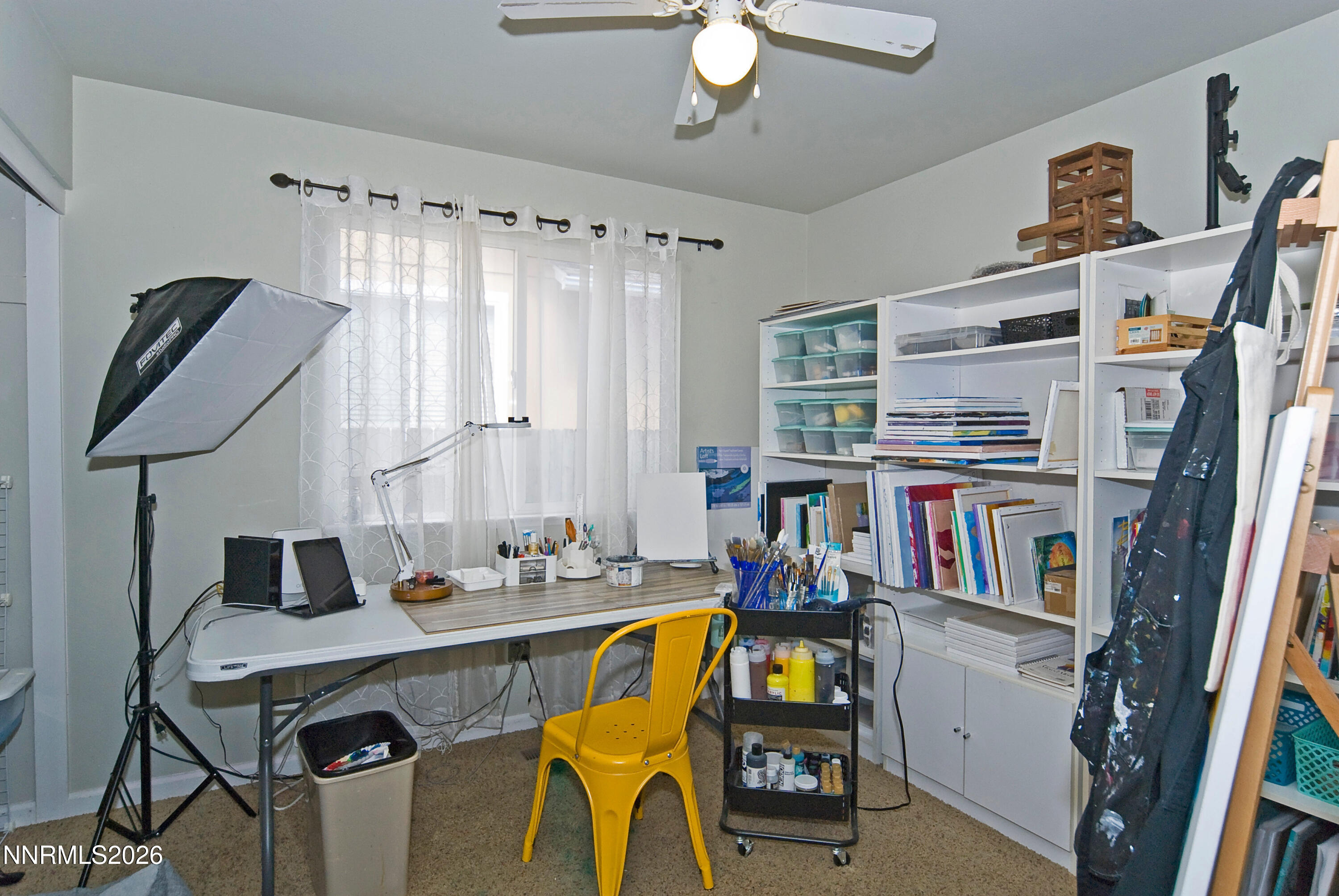 3289 Epic Avenue Reno, NV 89512 - Photo 24 of 32 a view of a workspace with furniture and a window
