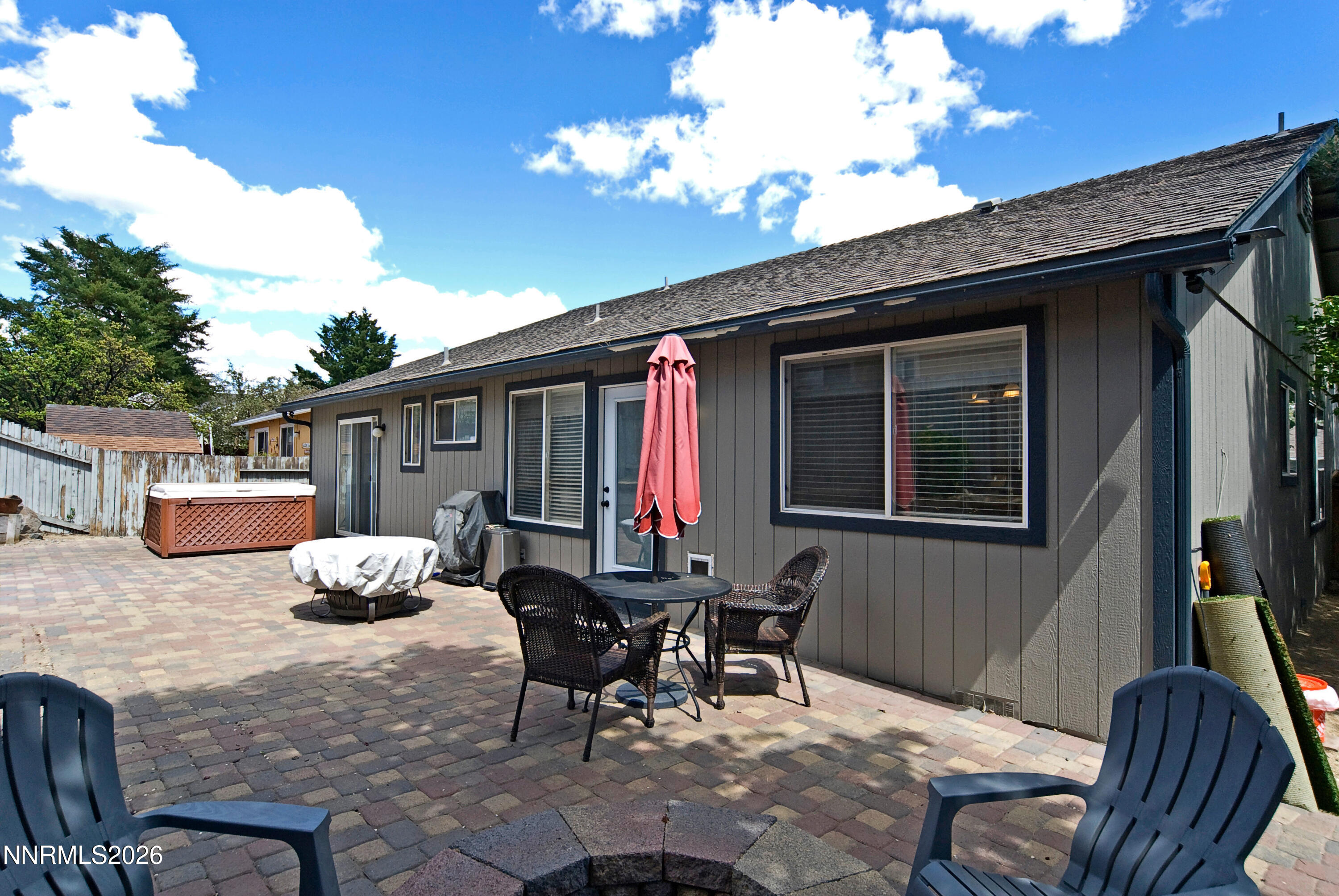 3289 Epic Avenue Reno, NV 89512 - Photo 28 of 32 a backyard of a house with outdoor seating