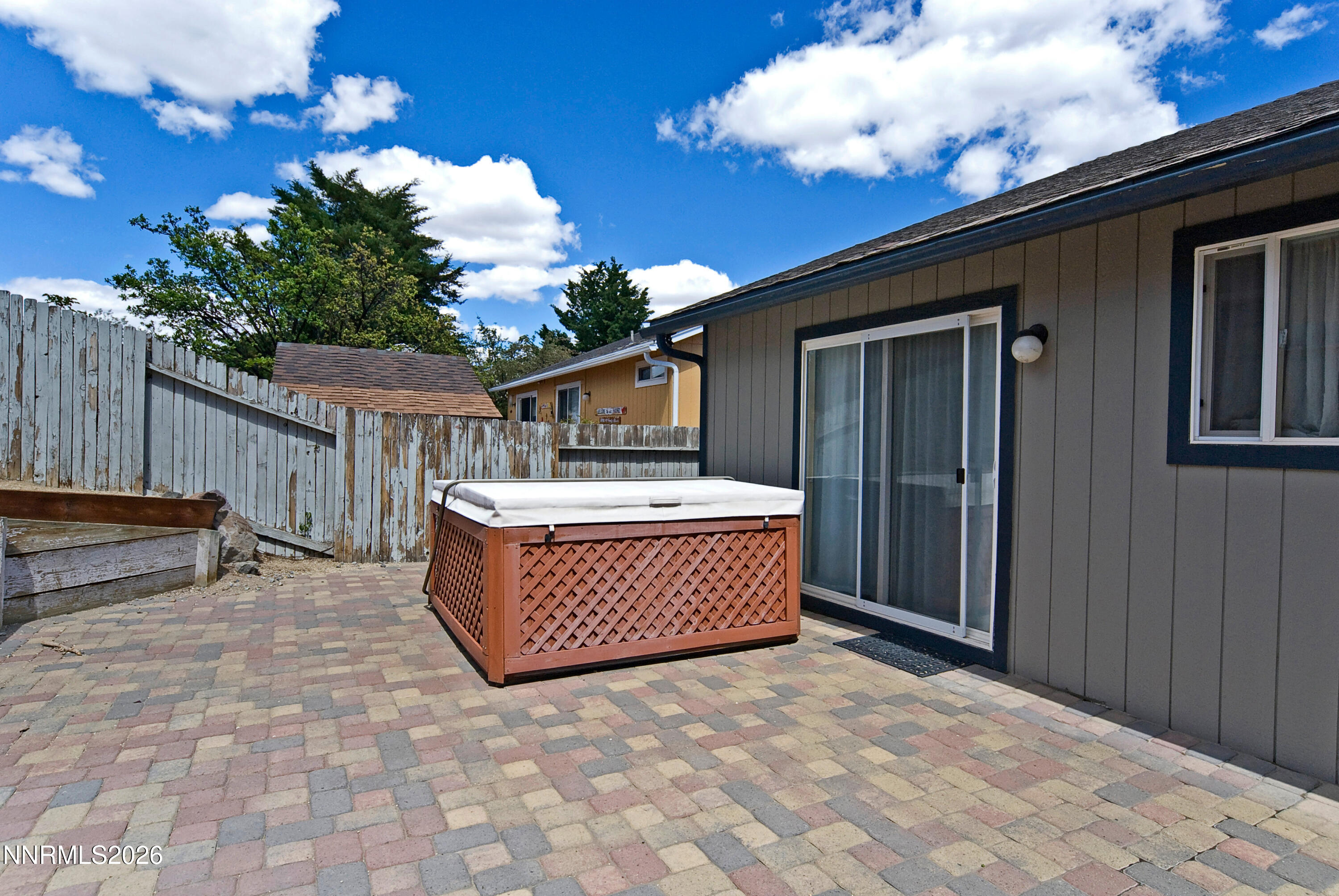 3289 Epic Avenue Reno, NV 89512 - Photo 29 of 32 a view of a house with a wooden fence