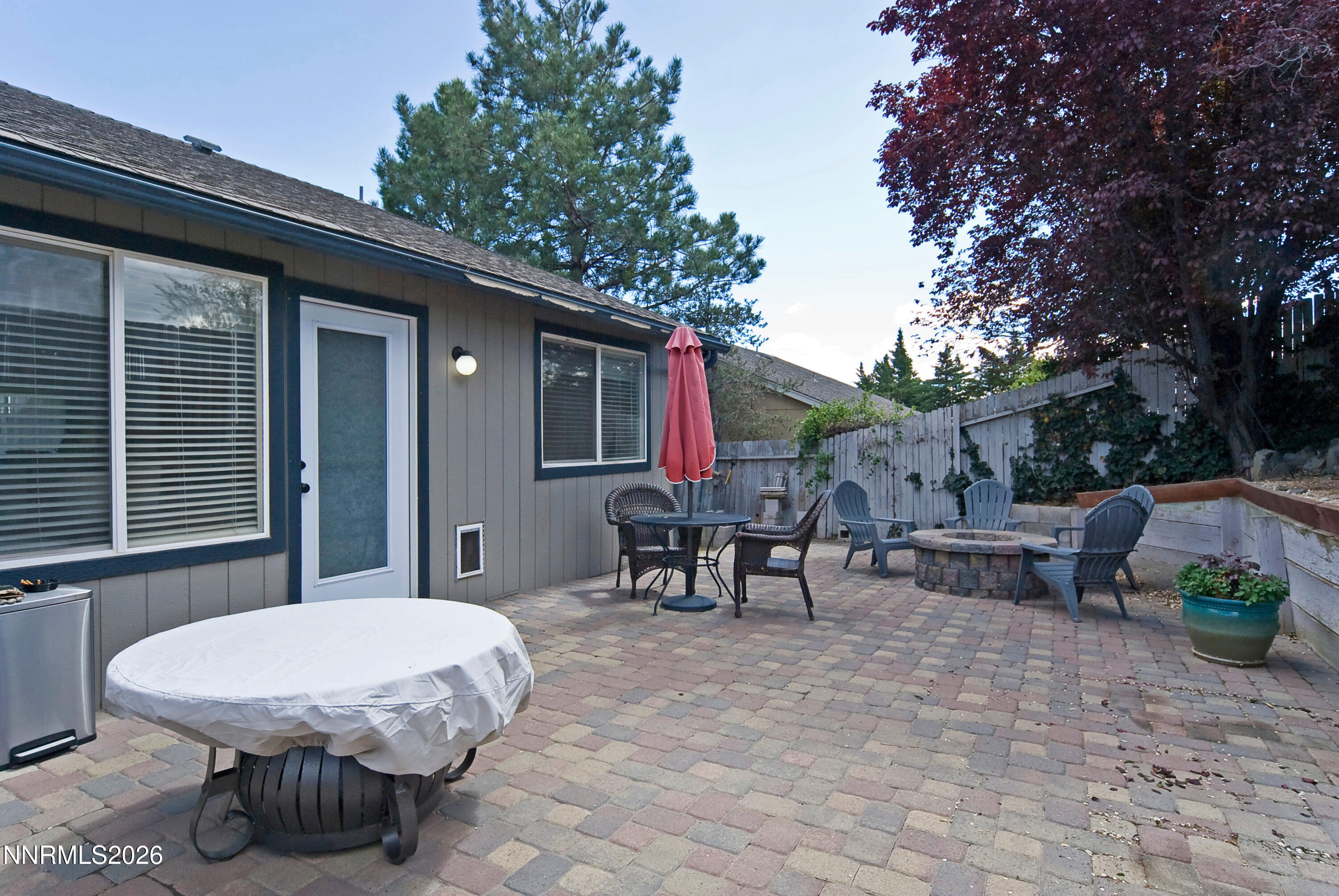 3289 Epic Avenue Reno, NV 89512 - Photo 30 of 32 a view of outdoor sitting area with chairs