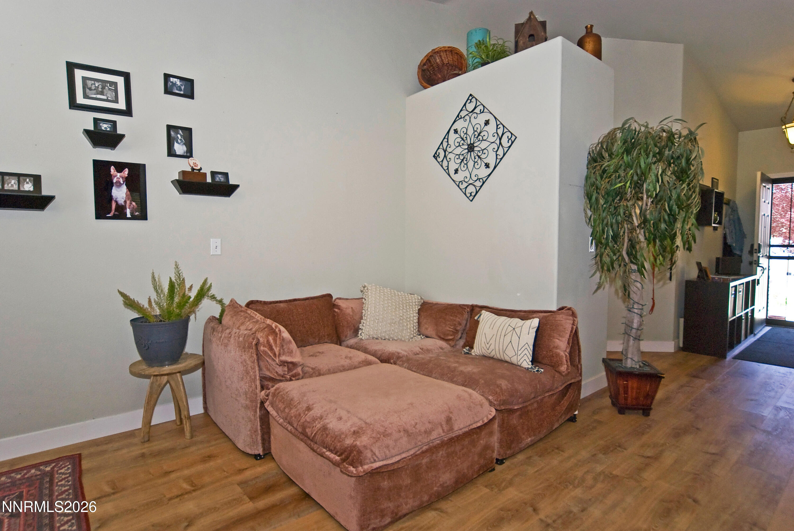 3289 Epic Avenue Reno, NV 89512 - Photo 10 of 32 a living room with furniture and a potted plant