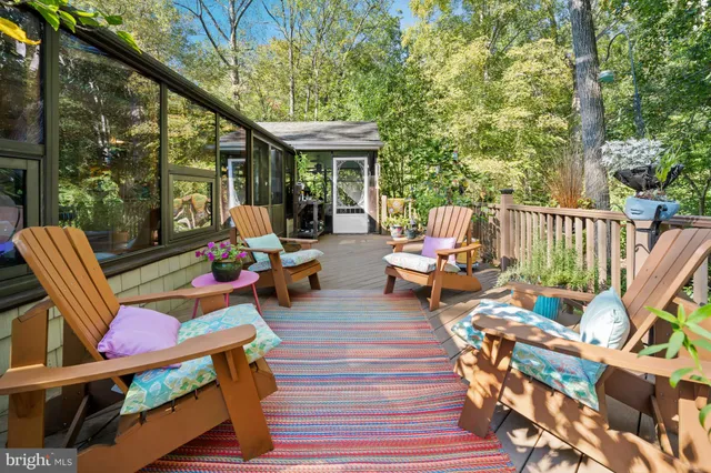 a outdoor space with patio the couches and a dining table with chairs