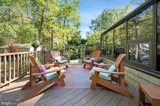 a view of a backyard with sitting area and furniture