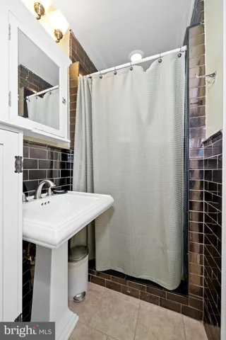 a bedroom with a bed and a table