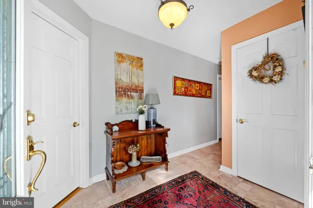 a living room with furniture and rug