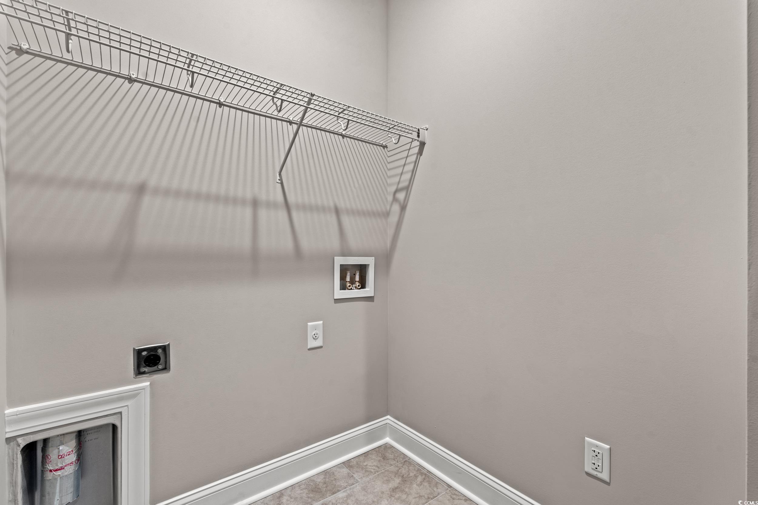 344 Kiskadee Loop, Unit B Conway, SC 29526 - Photo 25 of 32 Laundry room with tile patterned floors, electric