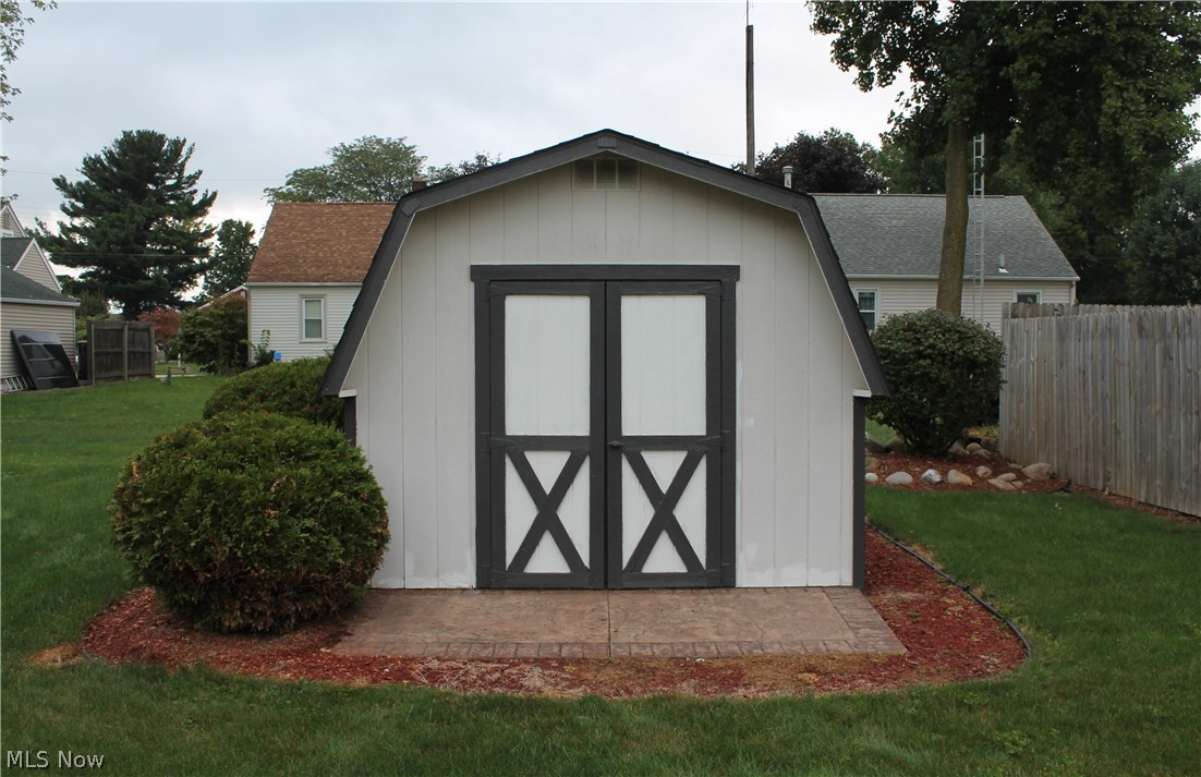 4885 Arbor Road Southwest Canton, OH 44710 - Photo 14 of 15 A shed for all the extras with a stamped concrete floor and lights.