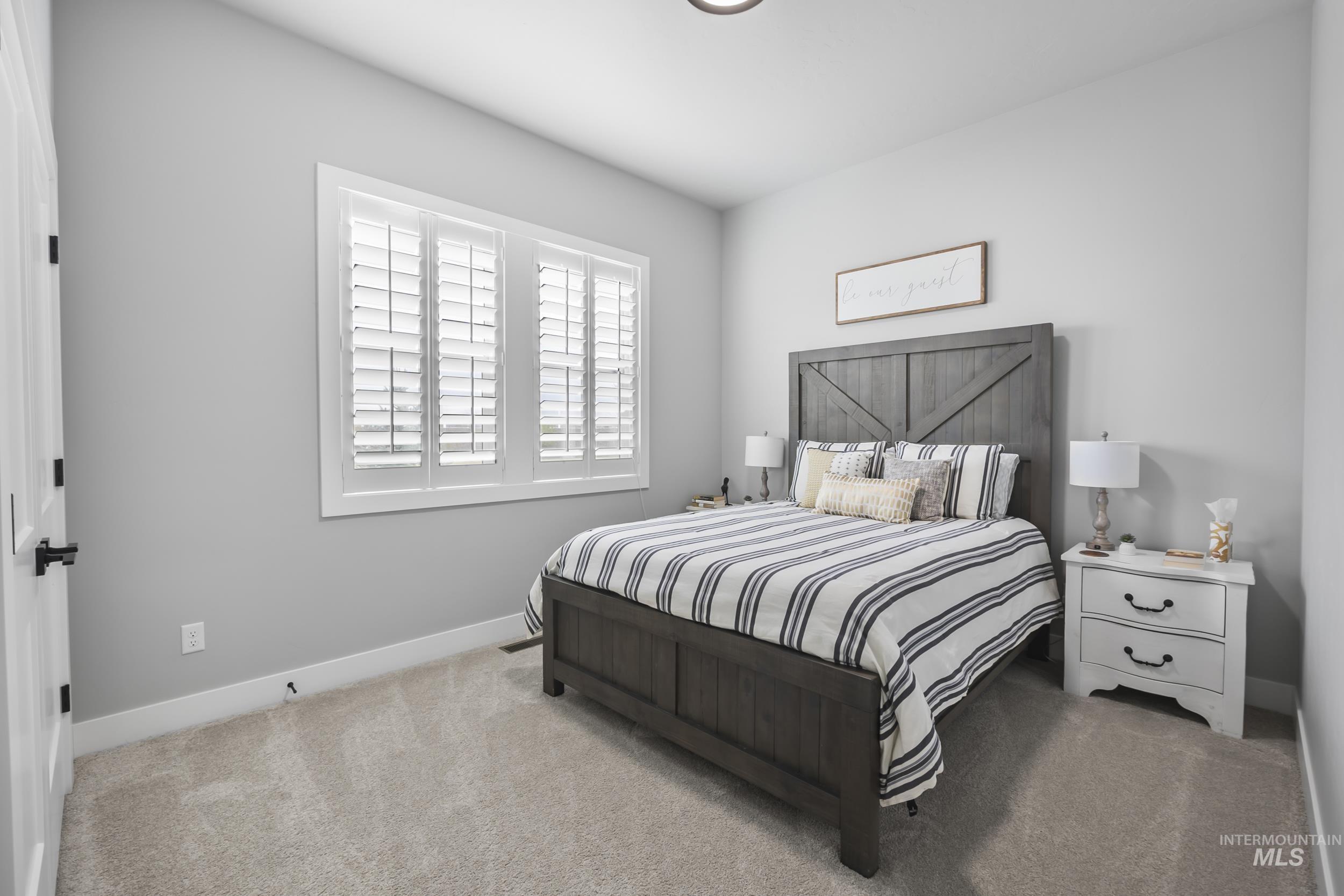 24696 Regal Road Middleton, ID 83644 - Photo 13 of 24 Bedroom featuring carpet floors and baseboards