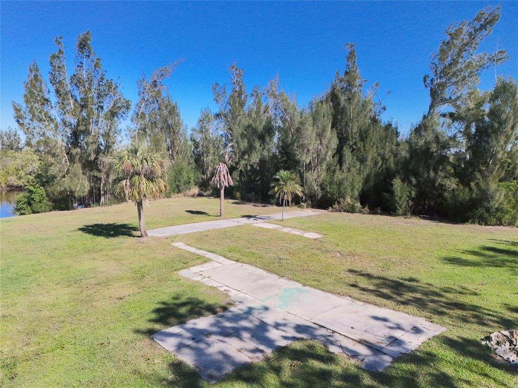 29530 Shell Creek Court Punta Gorda, FL 33982 - Photo 11 of 19 a view of a yard with trees