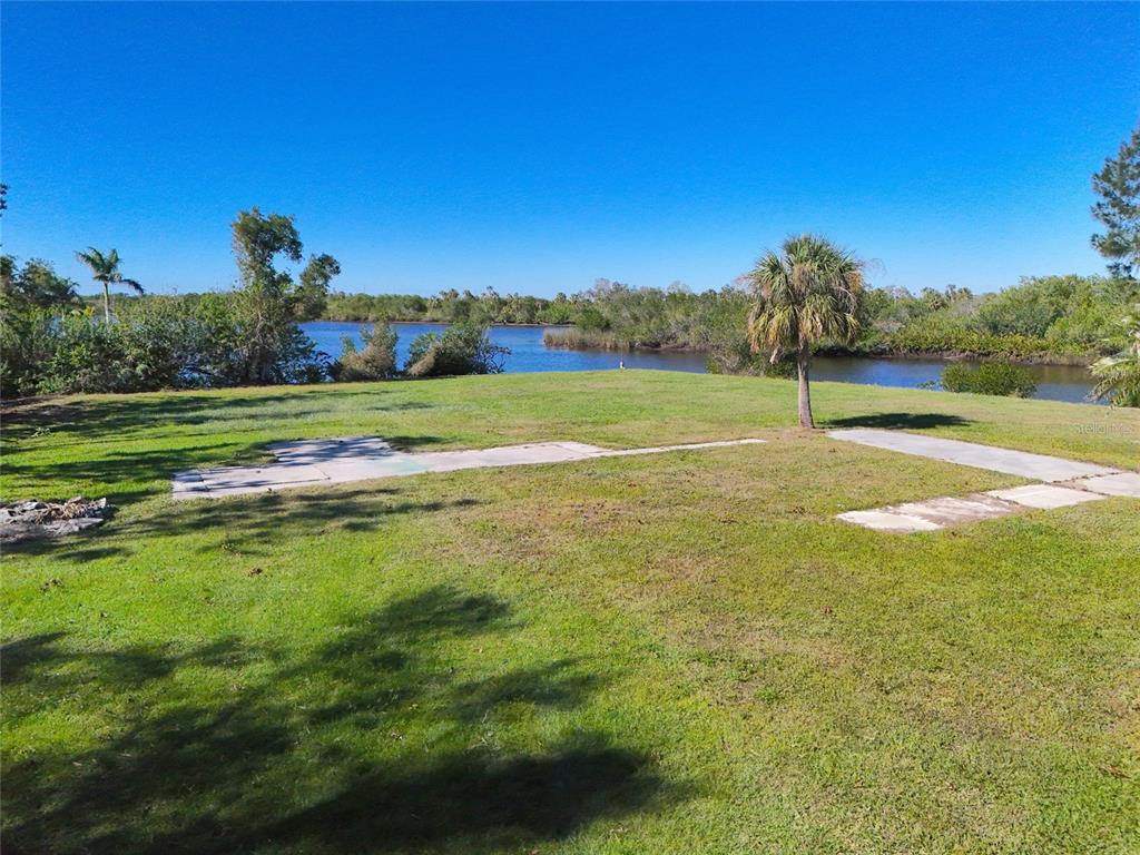 29530 Shell Creek Court Punta Gorda, FL 33982 - Photo 13 of 19 a view of a green field with clear sky