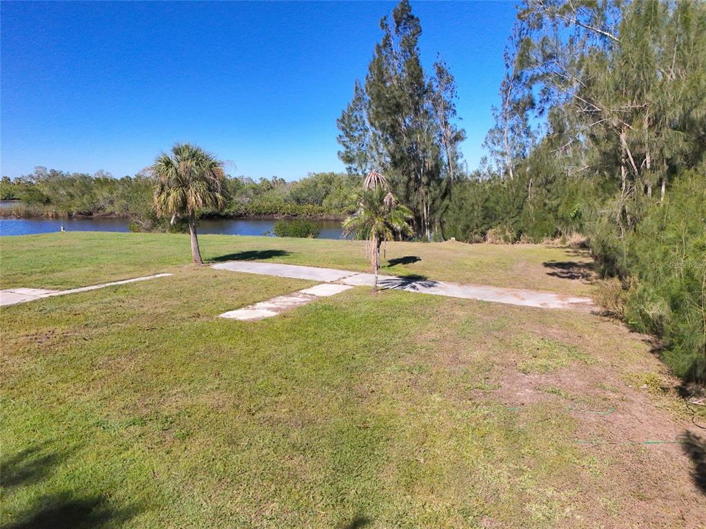 29530 Shell Creek Court Punta Gorda, FL 33982 - Photo 14 of 19 a view of outdoor space with trees