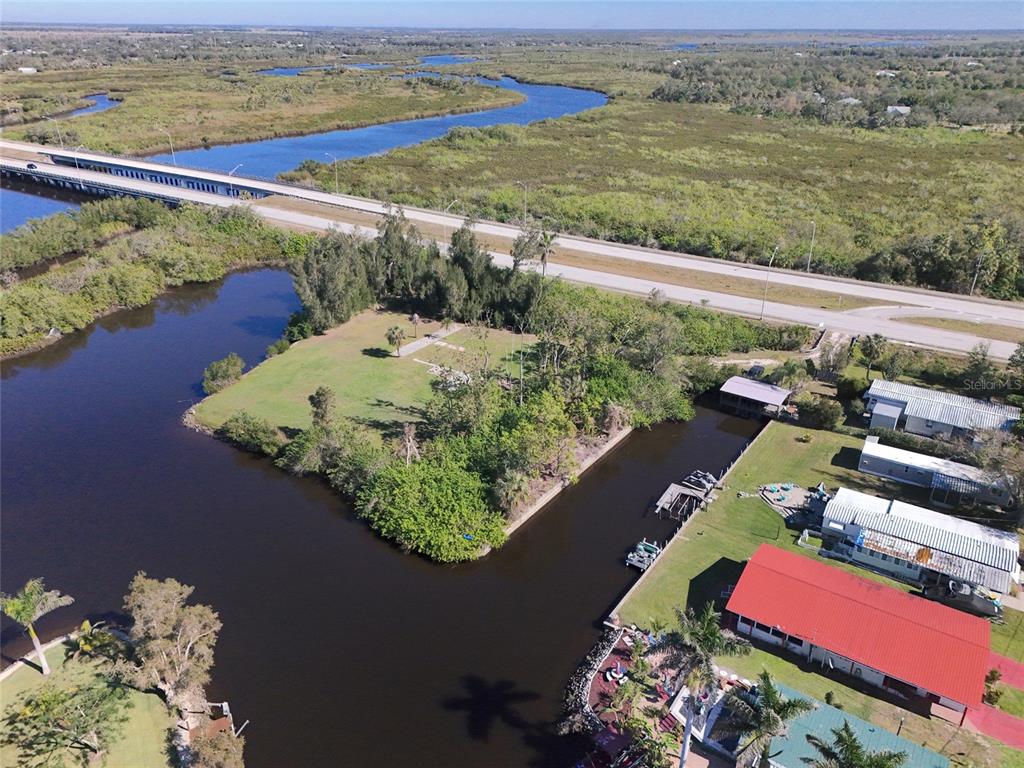 29530 Shell Creek Court Punta Gorda, FL 33982 - Photo 4 of 19 an aerial view of a house yard swimming pool and outdoor seating