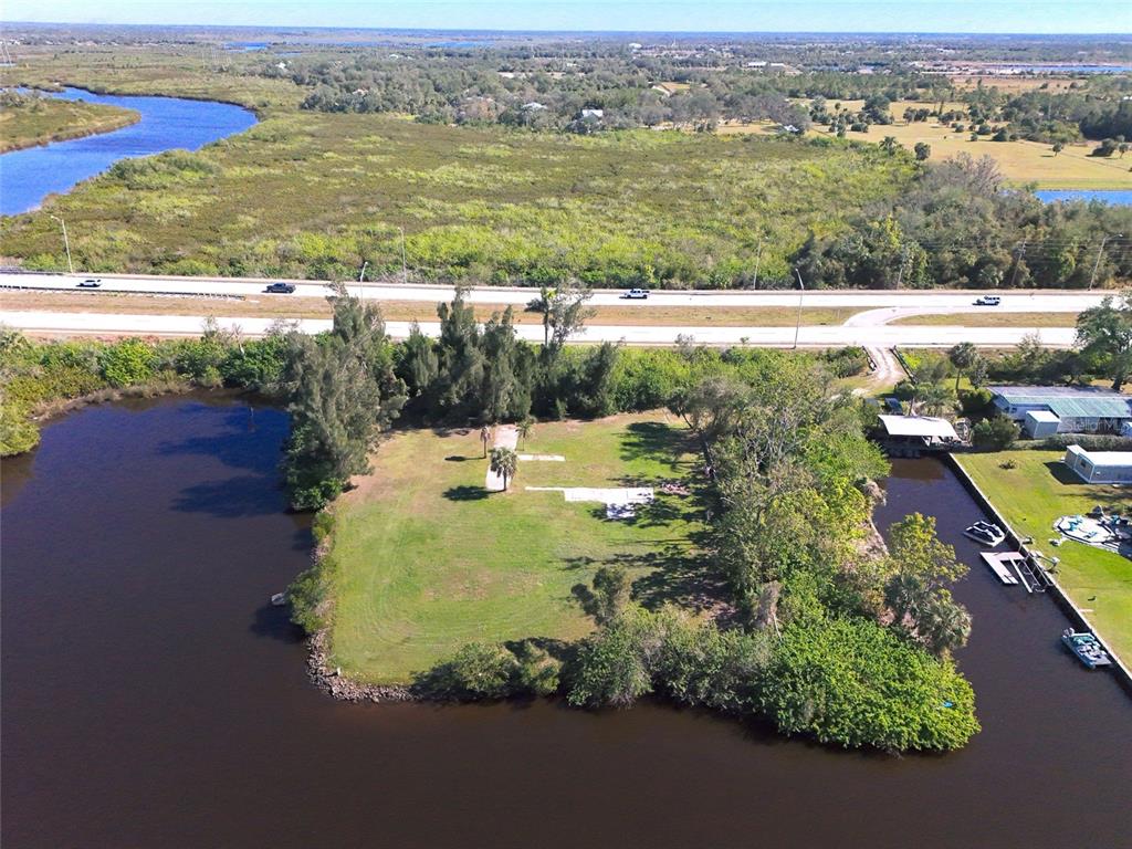 29530 Shell Creek Court Punta Gorda, FL 33982 - Photo 5 of 19 an aerial view of ocean with residential houses with outdoor space and lake view