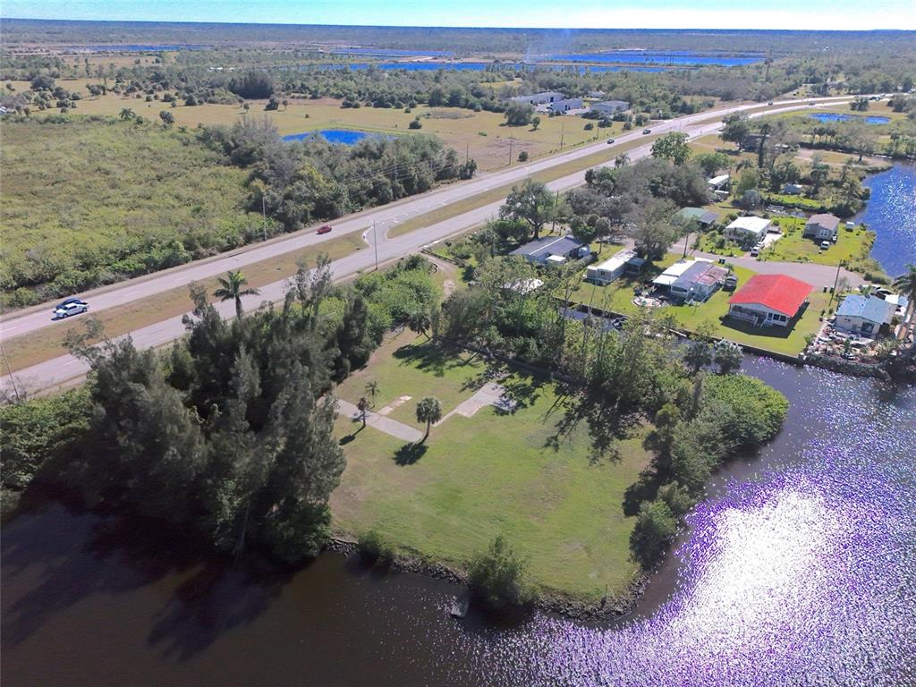29530 Shell Creek Court Punta Gorda, FL 33982 - Photo 8 of 19 an aerial view of a house with a yard