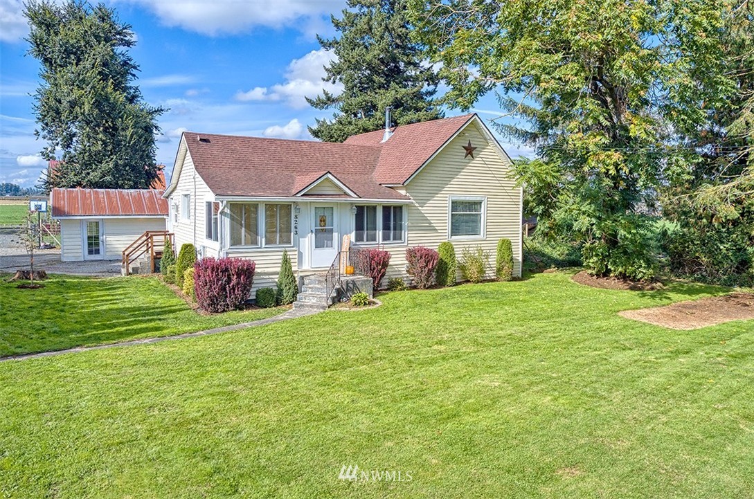 8263 Nooksack Road Everson, WA 98247 - Photo 20 of 36 a front view of house with yard and green space