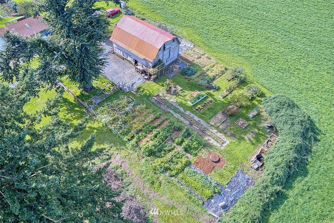 8263 Nooksack Road Everson, WA 98247 - Photo 21 of 36 an aerial view of a house with a yard
