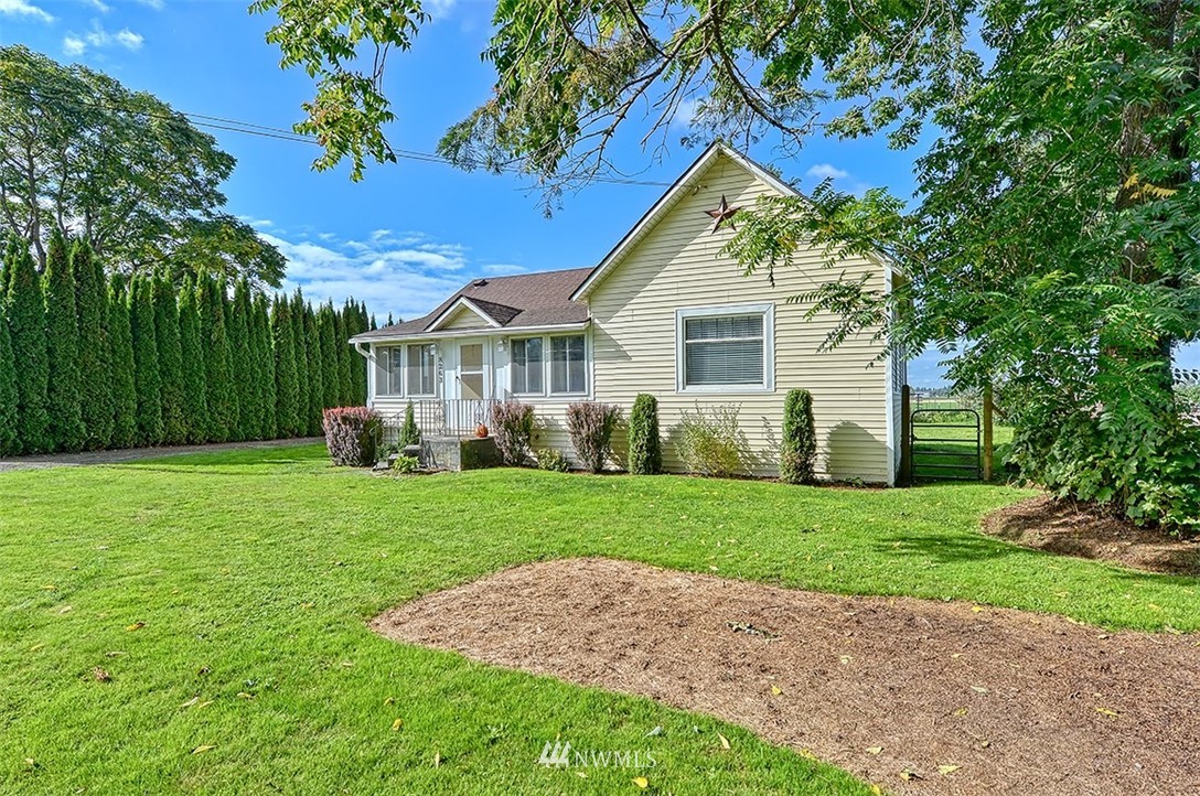 8263 Nooksack Road Everson, WA 98247 - Photo 28 of 36 a view of a house with a yard and tree s
