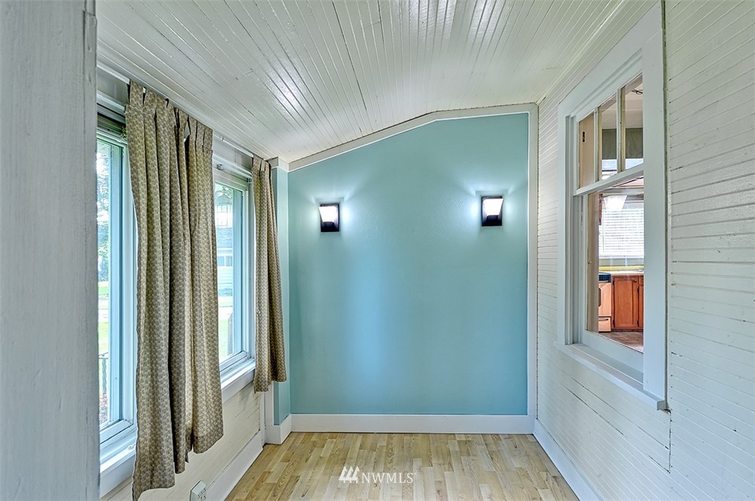 8263 Nooksack Road Everson, WA 98247 - Photo 4 of 36 a view of a hallway with entryway and wooden floor