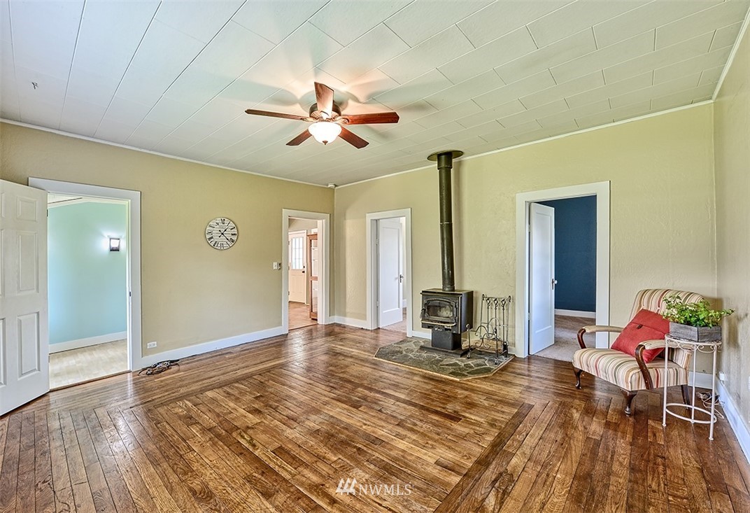 8263 Nooksack Road Everson, WA 98247 - Photo 5 of 36 a bedroom with a bed and a chandelier