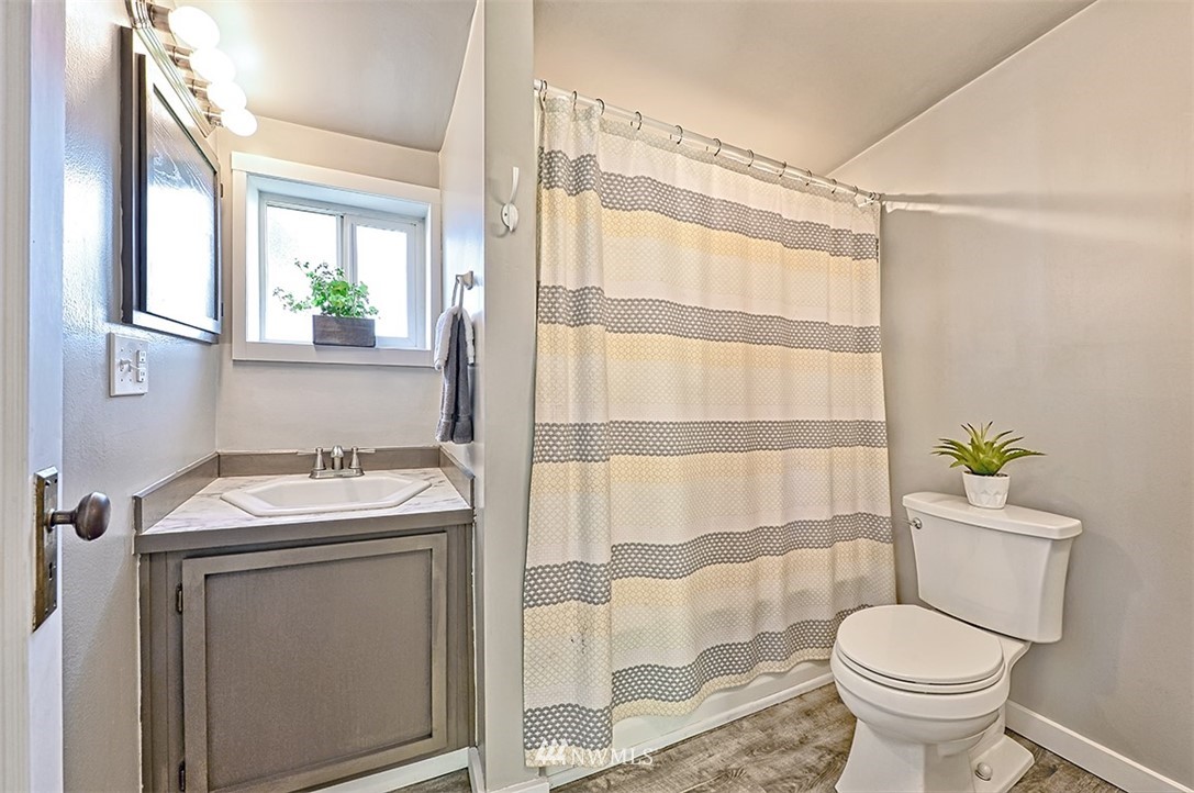 8263 Nooksack Road Everson, WA 98247 - Photo 6 of 36 a bathroom with a sink toilet and shower