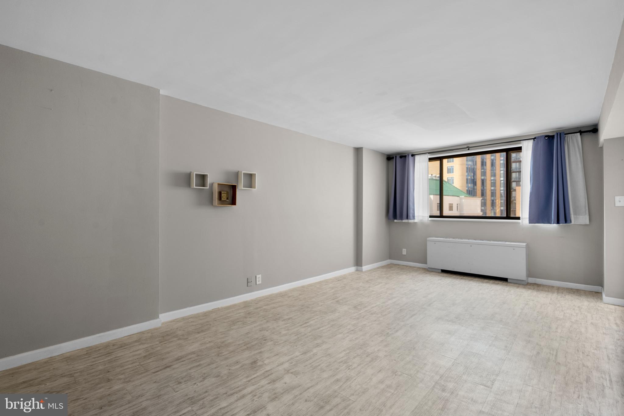 1420 N Street Northwest, Unit 914 Washington, DC 20005 - Photo 12 of 23 a view of an empty room with a window