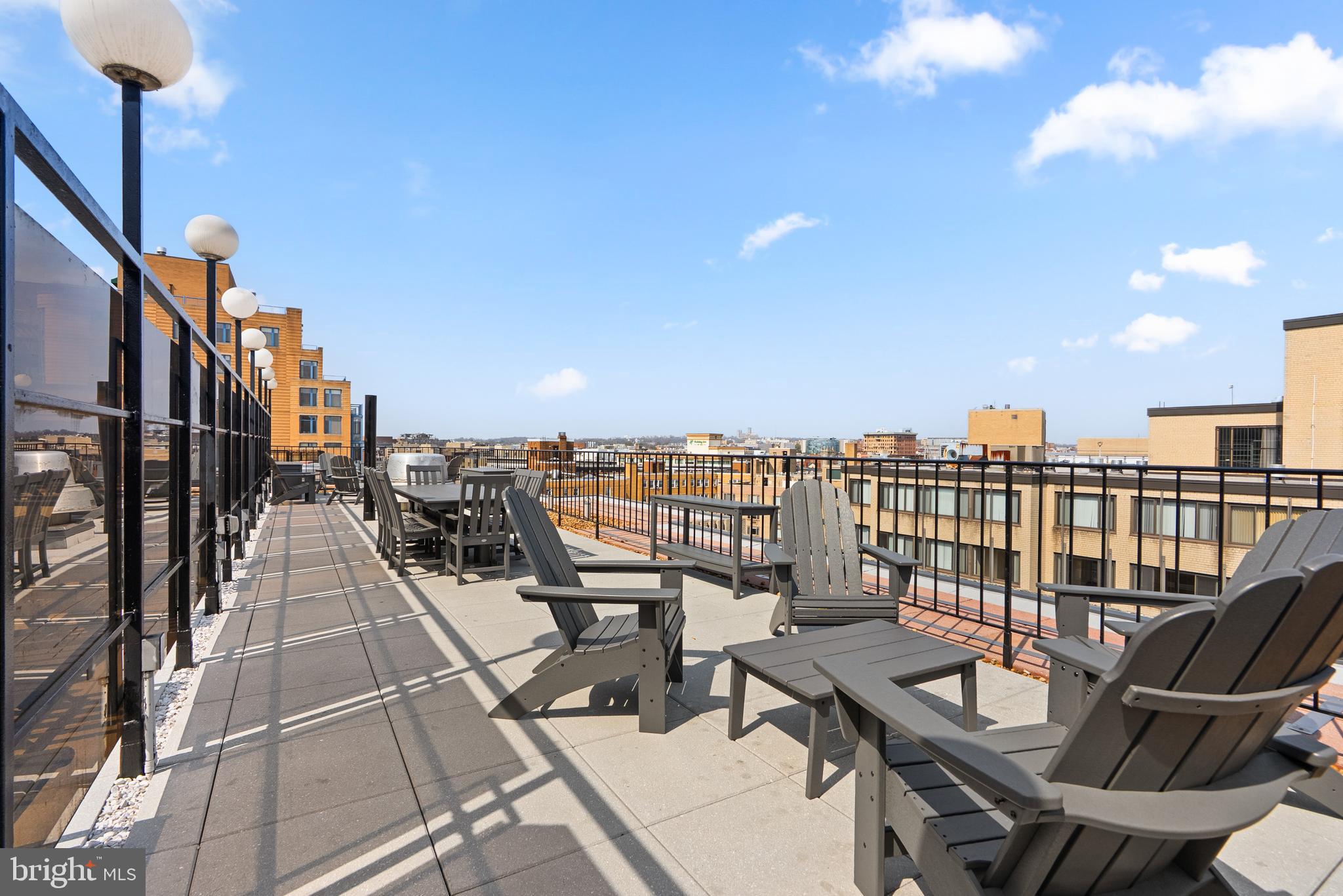 1420 N Street Northwest, Unit 914 Washington, DC 20005 - Photo 18 of 23 a view of a balcony with chairs