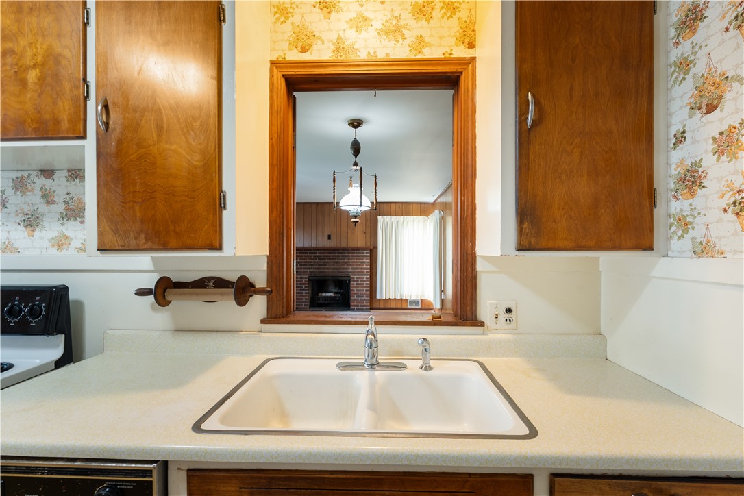 73 Wright Road Henrietta, NY 14467 - Photo 4 of 31 Kitchen sink looking into family room