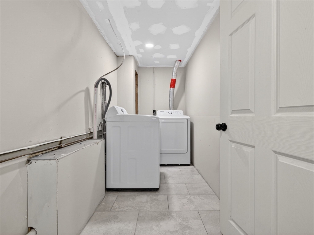 19 Melba Way Boston, MA 02136 - Photo 19 of 34 a utility room with dryer and washer